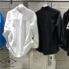 MARKM's genuine product from the Korean counter is available for purchase. It features a solid color versatile shirt with a lapel, drawstrings on both sides, and a chest pocket details Picture